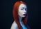 Girl with red hair red lips blue backlight