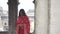 A girl in red indian traditional kurti standing on the roof