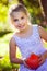 Girl with red kuri squash