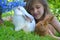 Girl with the red New Zealand and California rabbits