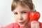 Girl in red shirt holding kitchen timer