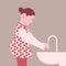 Girl in red washing hands