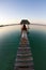 A girl refelecting on a tranquil lake