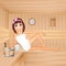 Girl relaxes in the sauna