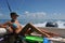 Girl relaxing on the back of motor boat