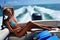 Girl relaxing on the back of motor boat