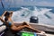 Girl relaxing on the back of motor boat