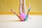 Girl with a rhythmic gymnastics clubs.Flexibility in acrobatics