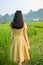 Girl in a rice field with karst scenery