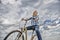 Girl rides bicycle sky background. Most satisfying form of self transportation. Carefree and satisfied. Woman feels free