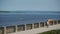 Girl rides on roller skates on the promenade.