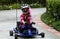 Girl riding go-kart