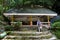 A girl rises to the gazebo near the Kathu waterfall