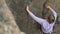 Girl rock climbing in nature