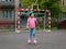 Girl rollerblading on the playground