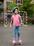 Girl rollerblading on the playground