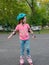 Girl rollerblading on the playground