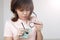 Girl rubs glasses from dust and stains.