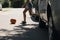 Girl running with ball on pedestrian crossing