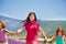 Girl running with her friends in lavender field