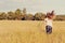 Girl running in meadow, freedom