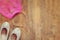 Girl\'s diamond tiara with pink chiffon vail next to ballet shoes
