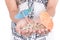 Girl\'s hands carrying sand with two mini umrellas