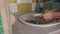 Girl's Hands are Washing Plate with Washcloth and Detergent in Full Sink Slowmo