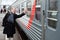 Girl says goodbye on rail platform