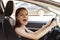 Girl screams at the wheel, is afraid to drive a car