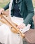 Girl Seated Playing Dulcimer Outdoors