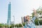 Girl selfie in front of Taipei 101.