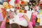 Girl sews doll clothes, top view, sewing accessories top view, seamstress workplace, many object for needlework, handmade and hand