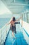 Girl on ship deck in fashion swimsuit. Summer vacation and travel to ocean. Fashion and beauty look. Marine traveling