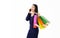 Girl with a shopping bag walking on mobile phone talking on White background