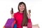 Girl shops with credit card holding colourful paper bags, smartphone