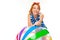 Girl in shorts and a t-shirt talking on the phone and leans on an inflatable ball on a white background