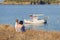 Girl Showing Mother Boat