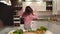 Girl Singing as Cooking