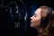 Girl sings.Microphone in a recording studio.Effective background.Vocal.Vocal schools and training