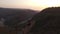 Girl sit down on a Sunset in forest boat