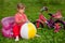 Girl sits in inflatable armchair in front of bike