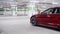 Girl sits in red car with head on steering wheel when other car stops nearby