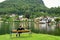 A girl sitting on a bench by the Lake Traun Traunsee