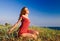 Girl sitting on a dune-3