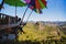 The girl sitting eating noodle in the rural village hanging legs style for viewpoint on the mountain,The local attractions of Mae