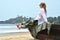 Girl sitting on the old fishing boat