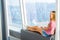 Girl Sitting in Skyscraper in Hong Kong