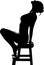 The girl sitting on a stool