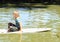 Girl sitting on surf